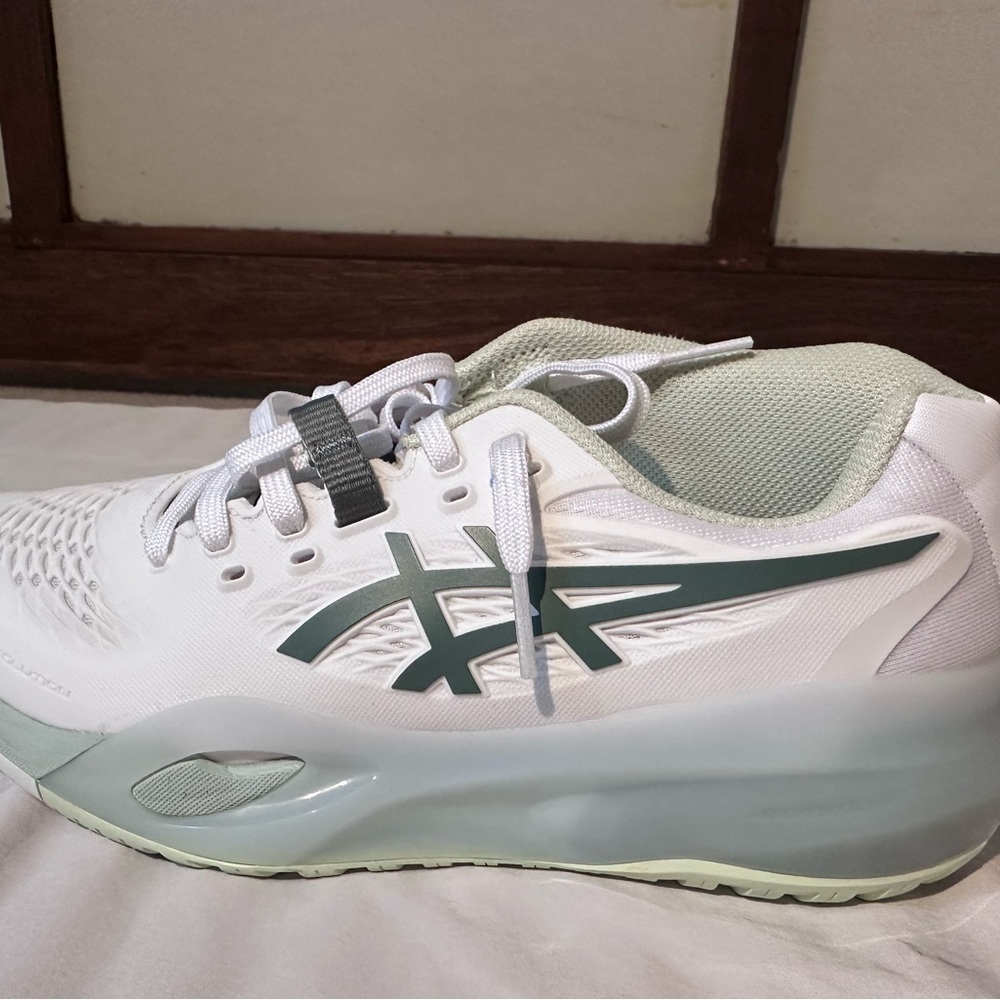 Asics White and Light Gray Women’s hard court tennis shoe
